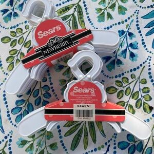 Small hangers for doll clothes like American Girl etc. or baby clothes